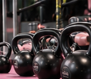 Kettlebells beneath warm lighting