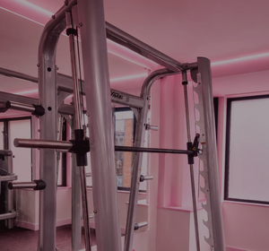 A Smith machine and cable rack in the strength area